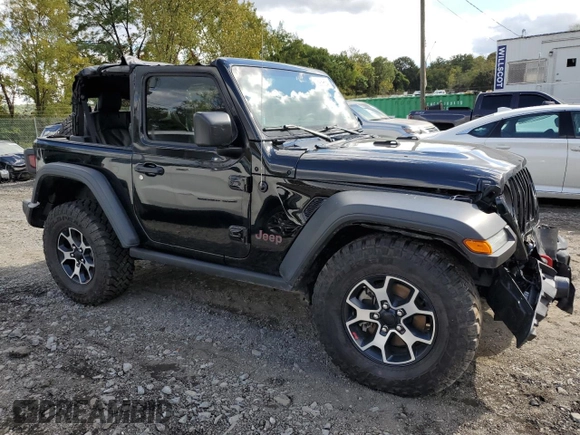 2023 Jeep Wrangler Rubicon with VIN 1C4HJXCGXPW545938, listed as a Copart auction lot 73939634 with 13,590 mi miles and Salvage title. Bid and sale history available at DreamBid. Image 4.