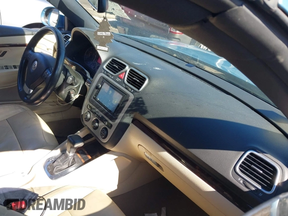 2007 Volkswagen Eos 2.0T with VIN WVWFA71FX7V051232, listed as a IAAI auction lot 41674652 with 88,617 mi miles and . Bid and sale history available at DreamBid. Image 5.