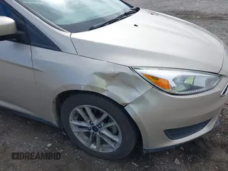2018 Ford Focus SE with VIN 1FADP3FE7JL230870, listed as a IAAI auction lot 42021541 with 84,000 mi miles. Bid and sale history available at carsss.com. Image 6.