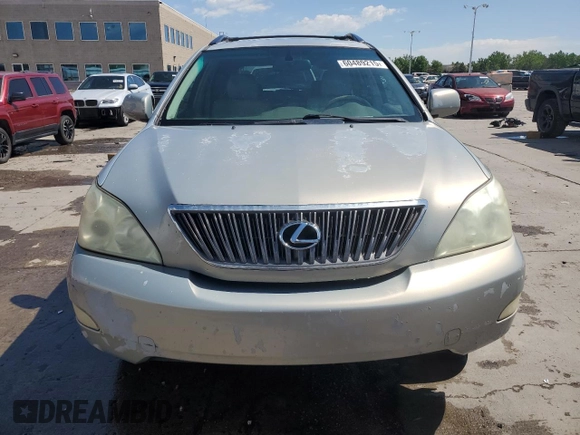 2005 Lexus RX 330 with VIN JTJGA31U350051558, listed as a Copart auction lot 60489215 with 216,702 mi miles and Salvage title. Bid and sale history available at DreamBid. Image 5.