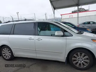 2011 Toyota Sienna XLE AAS with VIN 5TDYK3DC8BS148948, listed as a IAAI auction lot 41806293 with 144,645 mi miles and . Bid and sale history available at DreamBid. Image 14.