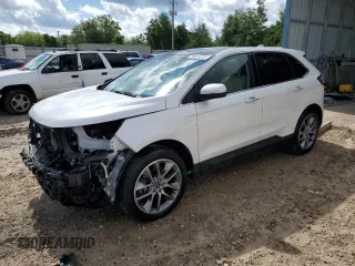 2015 Ford Edge Titanium z VIN 2FMPK3K85FBC05782, wystawiony jako Copart lot #56356595 z przebiegiem 165 202 mil mil oraz Szkoda całkowita • Salvage title. Historia ofert i sprzedaży dostępna na DreamBid. Obrazek 1.