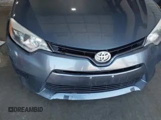 2016 Toyota Corolla L with VIN 5YFBURHE1GP482365, listed as a IAAI auction lot 41902840 with 124,165 mi miles and . Bid and sale history available at DreamBid. Image 6.