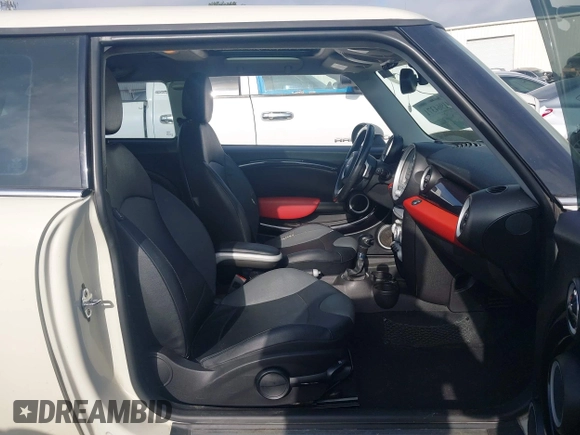 2007 MINI Hardtop with VIN WMWMF33587TT52466, listed as a IAAI auction lot 41964371 with 129,842 mi miles and . Bid and sale history available at DreamBid. Image 5.