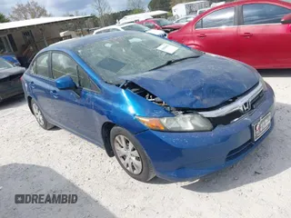 2012 Honda Civic Sdn LX with VIN 19XFB2F51CE056933, listed as a IAAI auction lot 41886402 with 126,381 mi miles. Bid and sale history available at carsss.com. Image 1.