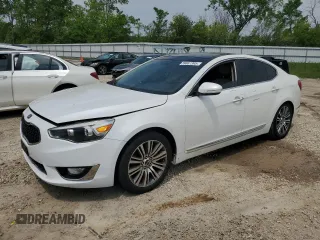 2014 Kia Cadenza Premium z VIN KNALN4D71E5121043, wystawiony jako Copart lot #59667395 z przebiegiem 244 797 mil mil oraz Czysty tytuł • Clean title. Historia ofert i sprzedaży dostępna na DreamBid. Obrazek 1.