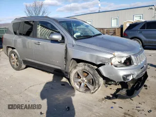 2016 Jeep Compass Latitude with VIN 1C4NJDEB2GD697923, listed as a Copart auction lot 84081394 with 167,240 mi miles and Salvage Title. Bid and sale history available at carsss.com. Image 4.