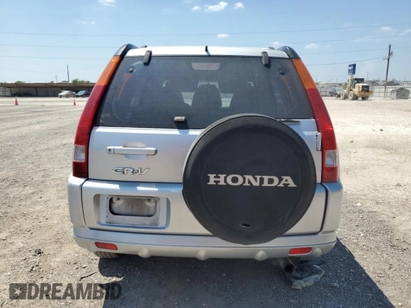 2002 Honda CR-V LX with VIN JHLRD68512C025394, listed as a Copart auction lot 67161964 with 143,660 mi miles and Salvage Title. Bid and sale history available at DreamBid. Image 6.