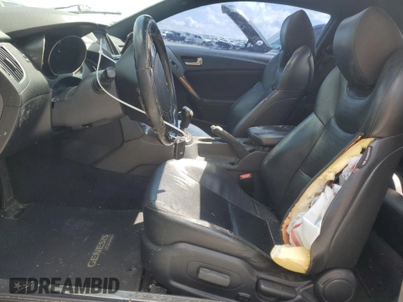 2014 Hyundai Genesis Coupe Ultimate z VIN KMHHU6KJ3EU118958, wystawiony jako Copart lot #56551845 z przebiegiem 149 695 mil mil oraz Szkoda całkowita • Salvage title. Historia ofert i sprzedaży dostępna na DreamBid. Obrazek 7.