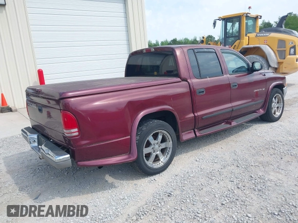 2001 Dodge Dakota Sport with VIN 1B7HL2AN91S278613, listed as a IAAI auction lot 42047239 with 178,321 mi miles and . Bid and sale history available at carsss.com. Image 4.