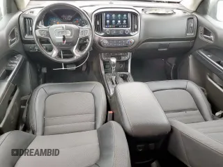 2022 GMC Canyon 4WD AT4 z VIN 1GTG6FEN2N1210072, wystawiony jako Copart lot #57084565 z przebiegiem 64 897 mil mil oraz Szkoda całkowita • Salvage title. Historia ofert i sprzedaży dostępna na DreamBid. Obrazek 8.