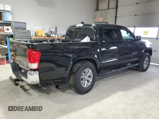 2017 Toyota Tacoma SR5 with VIN 5TFCZ5AN8HX067720, listed as a Copart auction lot 84801184 with 76,148 mi miles and Salvage title. Bid and sale history available at DreamBid. Image 3.
