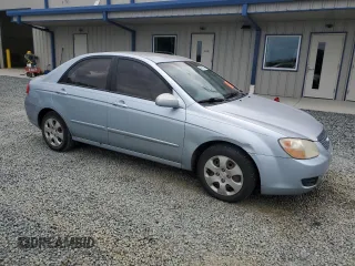 2007 Kia Spectra EX z VIN KNAFE121775389527, wystawiony jako Copart lot #56517285 z przebiegiem 340 861 mil mil oraz Szkoda całkowita • Salvage title. Historia ofert i sprzedaży dostępna na DreamBid. Obrazek 4.