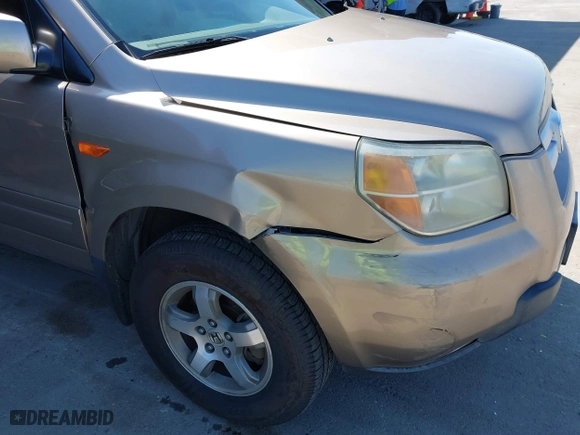 2006 Honda Pilot EX-L with RES with VIN 5FNYF28606B049523, listed as a IAAI auction lot 41736427 with 274,199 mi miles. Bid and sale history available at carsss.com. Image 12.