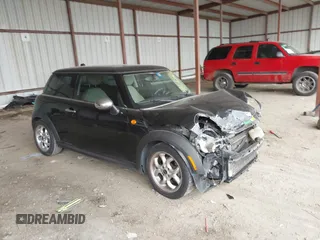 2011 MINI Hardtop with VIN WMWSU3C55BT092288, listed as a IAAI auction lot 41615275 with 114,486 mi miles and . Bid and sale history available at DreamBid. Image 1.