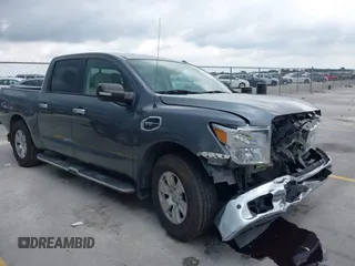 2017 Nissan Titan SV with VIN 1N6AA1E60HN563954, listed as a IAAI auction lot 42368434 with 112,555 mi miles and . Bid and sale history available at DreamBid. Image 1.