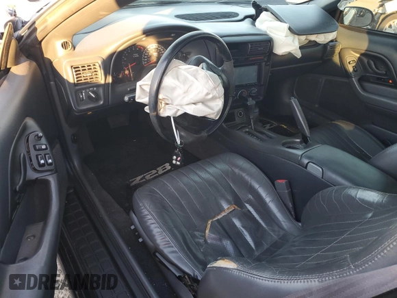 1999 Chevrolet Camaro Z28 z VIN 2G1FP22G2X2123246, wystawiony jako Copart lot #42869405 z przebiegiem 126 792 mil mil oraz Szkoda całkowita • Salvage title. Historia ofert i sprzedaży dostępna na DreamBid. Obrazek 8.