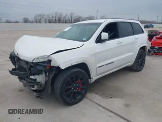 2018 Jeep Grand Cherokee Laredo E with VIN 1C4RJEAG0JC218694, listed as a IAAI auction lot 41587665 with 97,618 mi miles. Bid and sale history available at carsss.com. Image 2.
