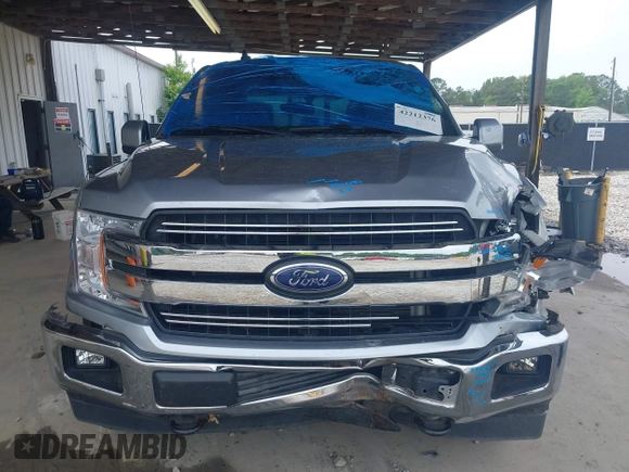 2020 Ford F-150 XL with VIN 1FTEW1E56LFA27123, listed as a IAAI auction lot 42212376 with 82,390 mi miles and . Bid and sale history available at DreamBid. Image 12.