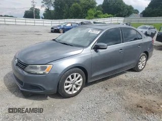 2013 Volkswagen Jetta SE with VIN 3VWDX7AJ9DM424032, listed as a Copart auction lot 60962535 with 143,153 mi miles and Salvage title. Bid and sale history available at DreamBid. Image 1.