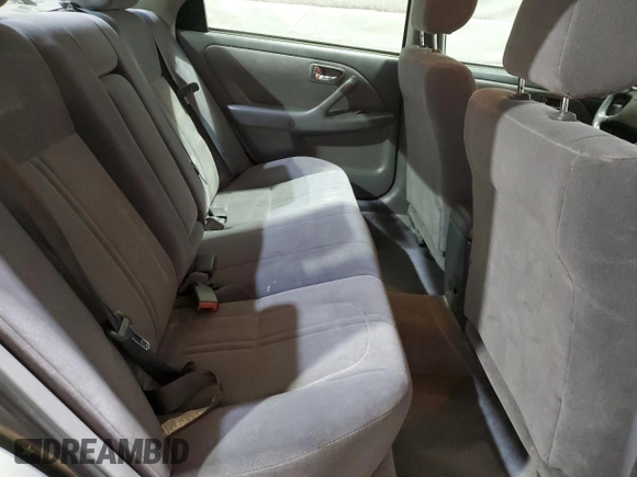 2001 Toyota Camry CE z VIN JT2BG28K810573972, wystawiony jako Copart lot #51733485 z przebiegiem 143 665 mil mil oraz Szkoda całkowita • Salvage title. Historia ofert i sprzedaży dostępna na DreamBid. Obrazek 10.