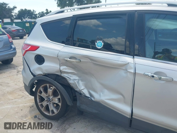 2014 Ford Escape Titanium с VIN 1FMCU0J91EUD93260, выставлен на аукционе IAAI как лот 42495051 с пробегом 97 164 миль миль и . История ставок и продаж доступна на DreamBid. Изображение 13.