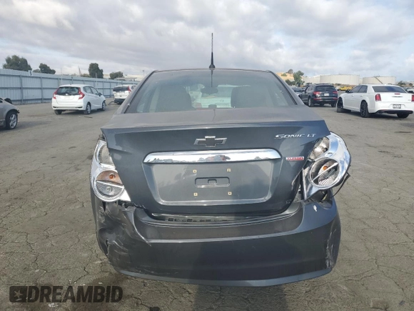 2012 Chevrolet Sonic LT z VIN 1G1JD5SBXC4225133, wystawiony jako Copart lot #68525054 z przebiegiem 93 000 mil mil oraz Szkoda całkowita • Salvage title. Historia ofert i sprzedaży dostępna na DreamBid. Obrazek 6.