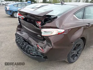 2019 Ford Fusion SE with VIN 3FA6P0HD0KR136232, listed as a IAAI auction lot 42015102 with 66,472 mi miles. Bid and sale history available at carsss.com. Image 6.