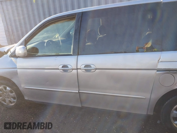 2002 Honda Odyssey EX z VIN 2HKRL18652H566576, wystawiony jako IAAI lot #40974704 z przebiegiem 232 172 mil mil oraz . Historia ofert i sprzedaży dostępna na DreamBid. Obrazek 14.