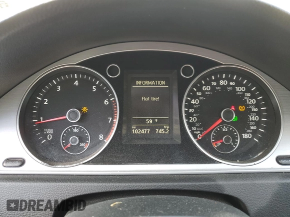 2015 Volkswagen CC Sport with VIN WVWBN7AN4FE814712, listed as a Copart auction lot 48027705 with 102,477 mi miles and Salvage Title. Bid and sale history available at DreamBid. Image 9.