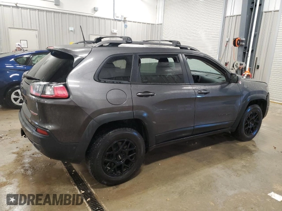 2019 Jeep Cherokee Trailhawk Elite с VIN 1C4PJMBN6KD162156, выставлен на аукционе Copart как лот 83041704 с пробегом 100 616 миль миль и Списание • Salvage title. История ставок и продаж доступна на DreamBid. Изображение 3.