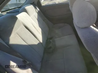 2004 Kia Spectra z VIN KNAFB121045315435, wystawiony jako Copart lot #83082084 z przebiegiem 94 974 mil mil oraz Czysty tytuł • Clean title. Historia ofert i sprzedaży dostępna na DreamBid. Obrazek 10.