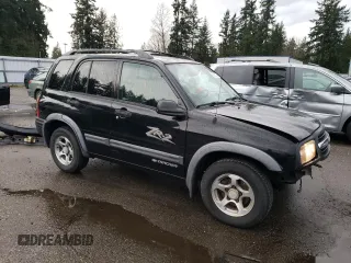 2003 Chevrolet Tracker ZR2 z VIN 2CNBJ734736946410, wystawiony jako Copart lot #82210474 z przebiegiem 61 414 mil mil oraz Szkoda całkowita • Salvage title. Historia ofert i sprzedaży dostępna na DreamBid. Obrazek 4.