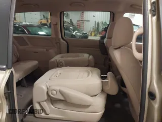 2009 Kia Sedona LX with VIN KNDMB233996314804, listed as a IAAI auction lot 42014187 with 220,693 mi miles and . Bid and sale history available at DreamBid. Image 8.