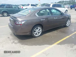2014 Nissan Maxima S with VIN 1N4AA5AP9EC430843, listed as a IAAI auction lot 42104446 with 159,256 mi miles and . Bid and sale history available at DreamBid. Image 4.