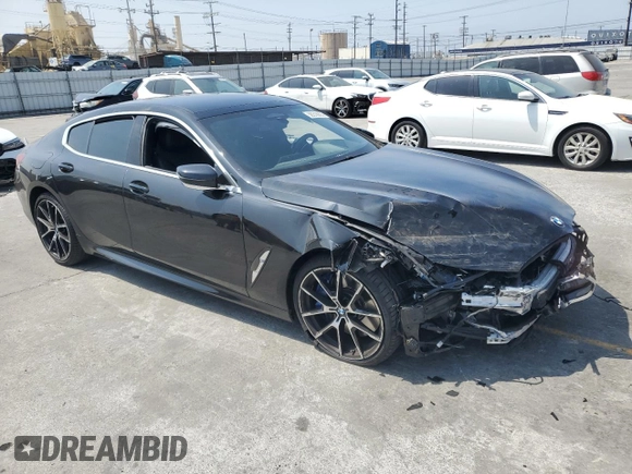 2020 BMW 8 Series M850i with VIN WBAGV8C01LCE50737, listed as a Copart auction lot 58318665 with Not provided miles and Salvage title. Bid and sale history available at DreamBid. Image 4.