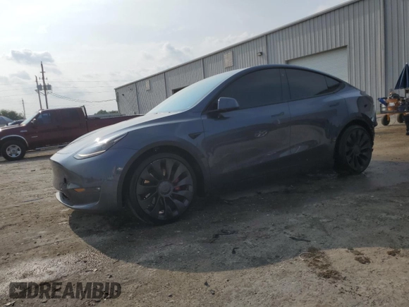 2022 Tesla Model Y Performance with VIN 7SAYGDEF4NF447462, listed as a Copart auction lot 58306595 with 61,671 mi miles and Non repairable. Bid and sale history available at DreamBid. Image 1.