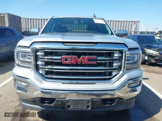2016 GMC Sierra 1500 SLT with VIN 3GTU2NEC8GG168325, listed as a IAAI auction lot 41885670 with 115,121 mi miles. Bid and sale history available at carsss.com. Image 13.