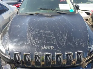 2017 Jeep Cherokee Altitude with VIN 1C4PJLAB7HW660624, listed as a IAAI auction lot 41488683 with 106,963 mi miles and . Bid and sale history available at DreamBid. Image 17.