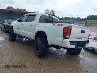 2019 Toyota Tacoma SR z VIN 3TMCZ5AN0KM232852, wystawiony jako IAAI lot #42178269 z przebiegiem 71 545 mil mil oraz . Historia ofert i sprzedaży dostępna na DreamBid. Obrazek 3.