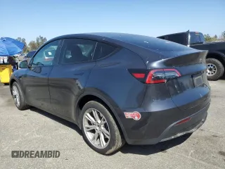 2024 Tesla Model Y Long Range z VIN 7SAYGDEE2RA223052, wystawiony jako Copart lot #61485025 z przebiegiem 13 268 mil mil oraz Szkoda całkowita • Salvage title. Historia ofert i sprzedaży dostępna na DreamBid. Obrazek 2.