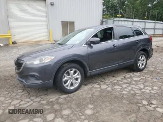 2015 Mazda CX-9 Touring z VIN JM3TB2CA3F0450975, wystawiony jako Copart lot #59106915 z przebiegiem 59 587 mil mil oraz Szkoda całkowita • Salvage title. Historia ofert i sprzedaży dostępna na DreamBid. Obrazek 1.