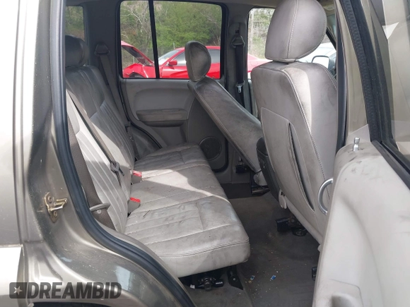 2005 Jeep Liberty Limited z VIN 1J4GK58K05W593417, wystawiony jako IAAI lot #41811582 z przebiegiem 116 027 mil mil oraz . Historia ofert i sprzedaży dostępna na DreamBid. Obrazek 8.