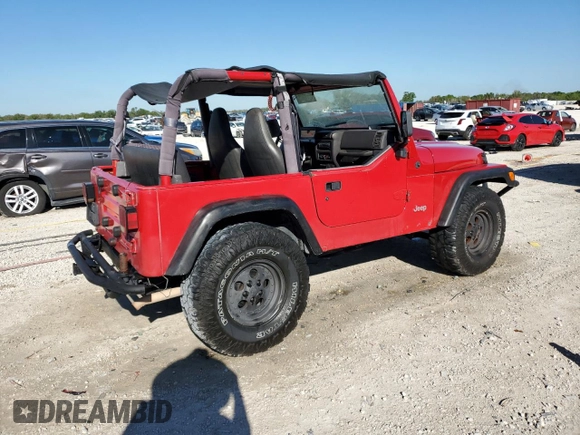 1999 Jeep Wrangler SE with VIN 1J4FY29P8XP483909, listed as a Copart auction lot 48679555 with 168,708 mi miles and Salvage title. Bid and sale history available at DreamBid. Image 3.