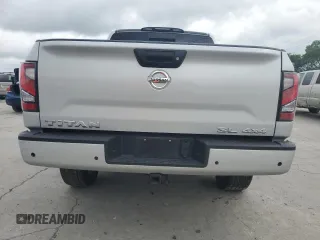 2020 Nissan Titan SL z VIN 1N6AA1ED1LN505973, wystawiony jako Copart lot #58721985 z przebiegiem 103 245 mil mil oraz Tytuł czysty. Historia ofert i sprzedaży dostępna na DreamBid. Obrazek 6.