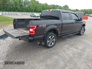 2020 Ford F-150 XL with VIN 1FTEW1EP3LFC56067, listed as a IAAI auction lot 42132791 with 103,357 mi miles and . Bid and sale history available at DreamBid. Image 4.