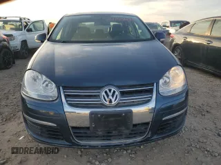 2007 Volkswagen Jetta z VIN 3VWDG71K27M010409, wystawiony jako Copart lot #84155424 z przebiegiem 140 665 mil mil oraz Czysty tytuł • Clean title. Historia ofert i sprzedaży dostępna na DreamBid. Obrazek 5.