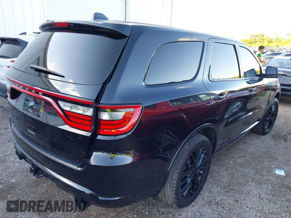 2015 Dodge Durango SXT with VIN 1C4RDJAG3FC888604, listed as a IAAI auction lot 40430993 with 89,352 mi miles and . Bid and sale history available at carsss.com. Image 4.