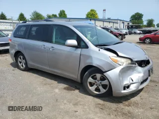 2011 Toyota Sienna LE AAS with VIN 5TDKK3DC0BS172912, listed as a Copart auction lot 59178015 with 137,140 mi miles and Salvage title. Bid and sale history available at DreamBid. Image 4.