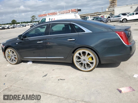 2018 Cadillac XTS Luxury z VIN 2G61M5S30J9135292, wystawiony jako Copart lot #57121115 z przebiegiem 95 110 mil mil oraz Szkoda całkowita • Salvage title. Historia ofert i sprzedaży dostępna na DreamBid. Obrazek 2.